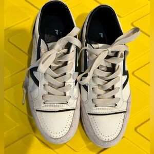 Vans White Sneakers with Black Trim